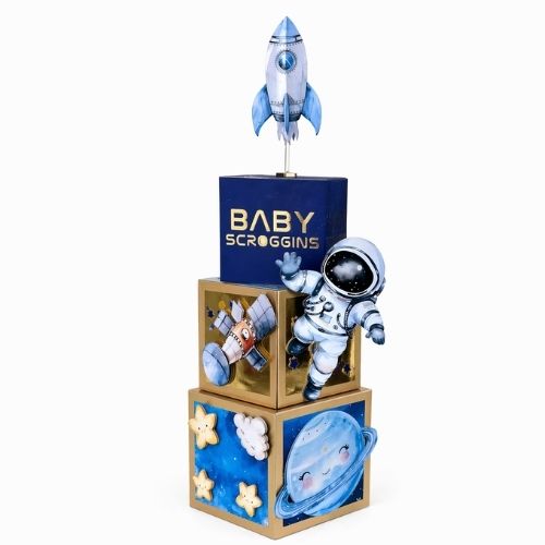 Custom party centerpiece with space theme design, personalized astronaut event table decor